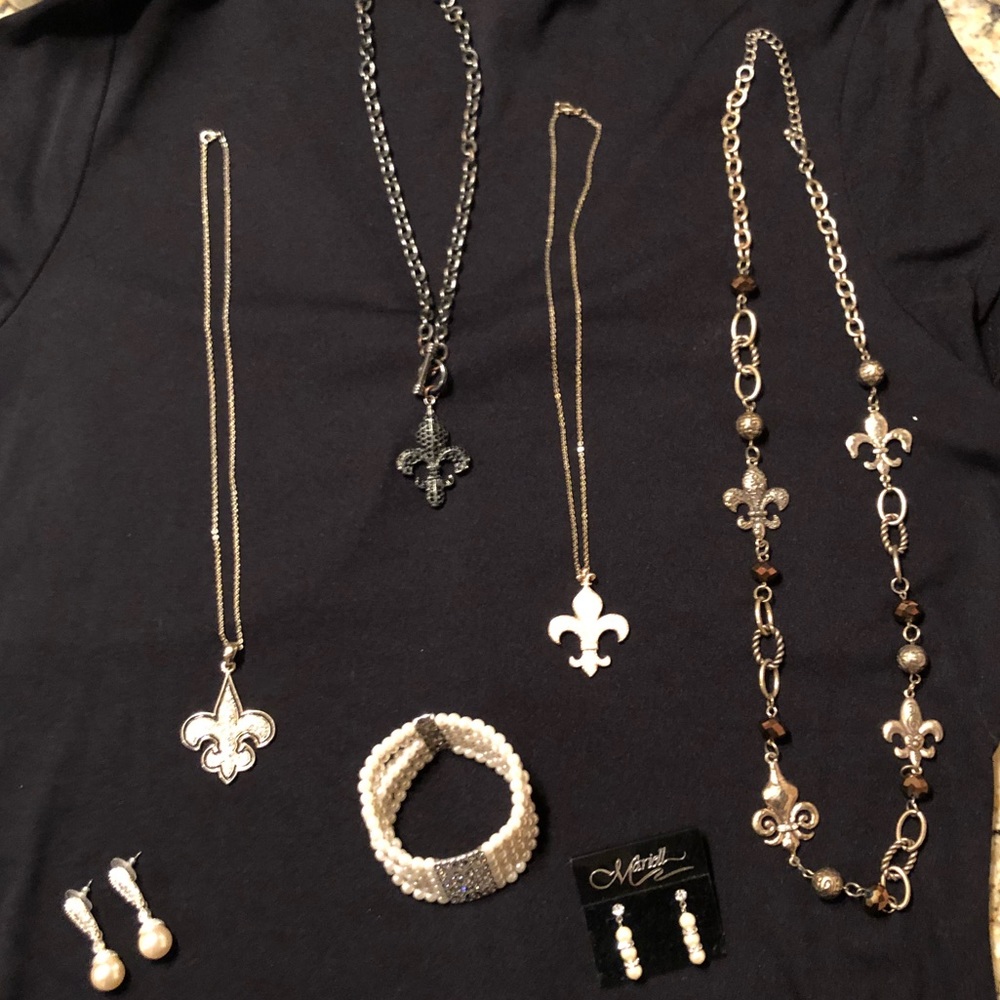 Fleur De Lis Jewelry $10 per item.